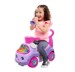 Fisher Price Muzyczna Parada jeździk Pulio fioletowy