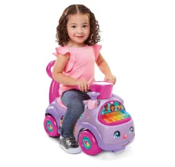 Fisher Price Muzyczna Parada jeździk Pulio fioletowy
